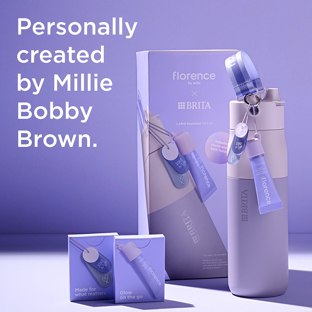 florence by mills x BRITA LARQ bottle with package and accessoires on purple background.