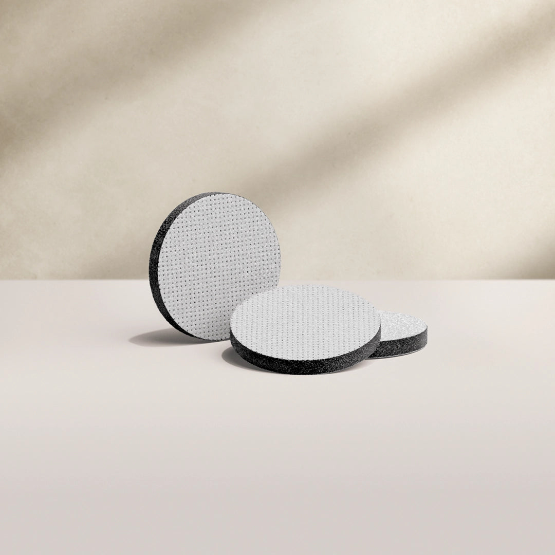 The BRITA MicroDisc on a beige background