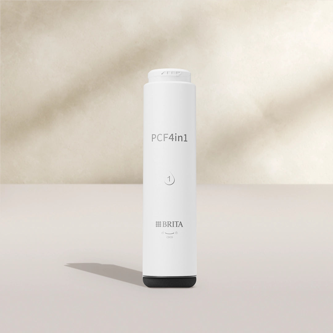 BRITA mypure green RO 4 in 1 PCF Filter on a beige background.
