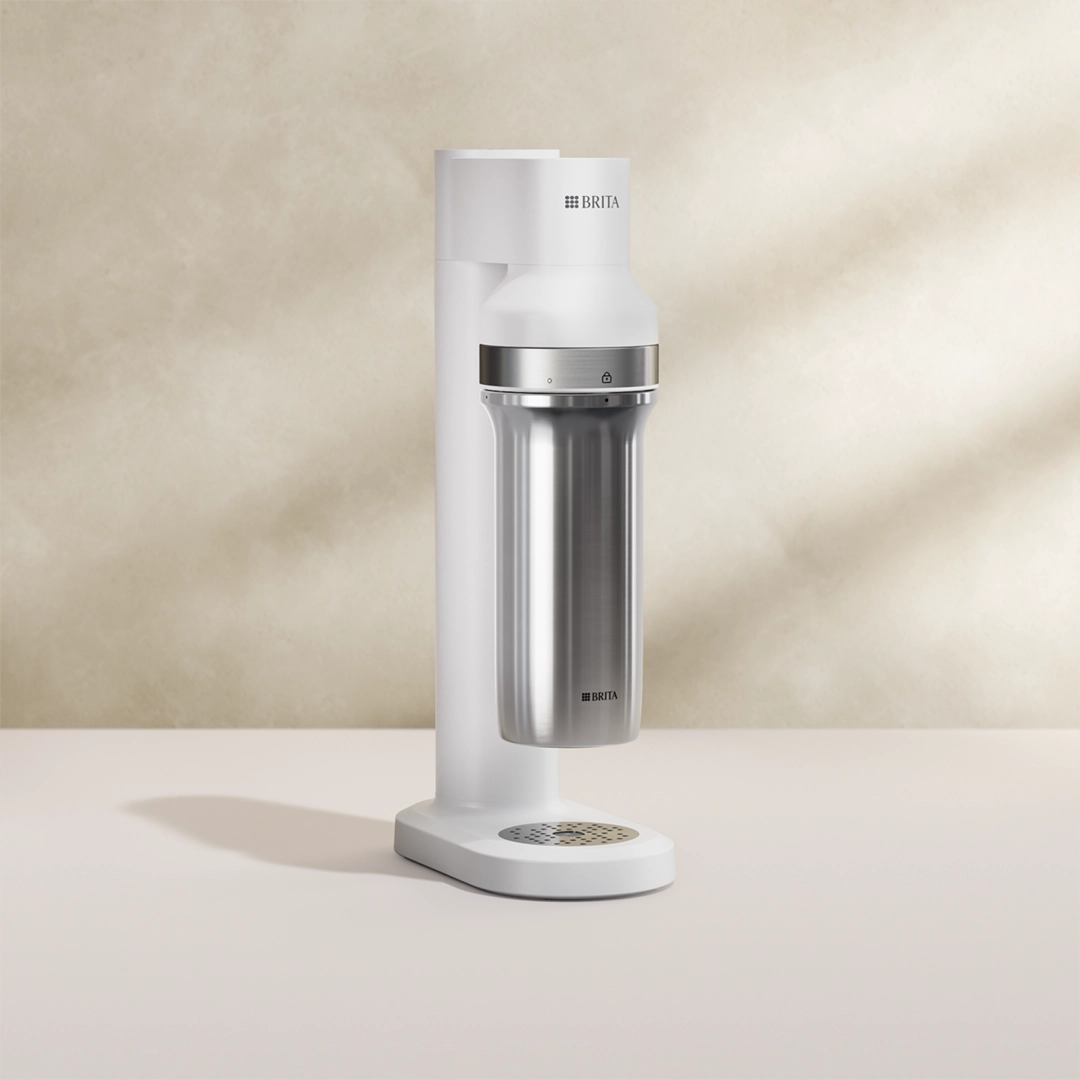 BRITA sodaTRIO Sparkling Water Maker in white on a beige background